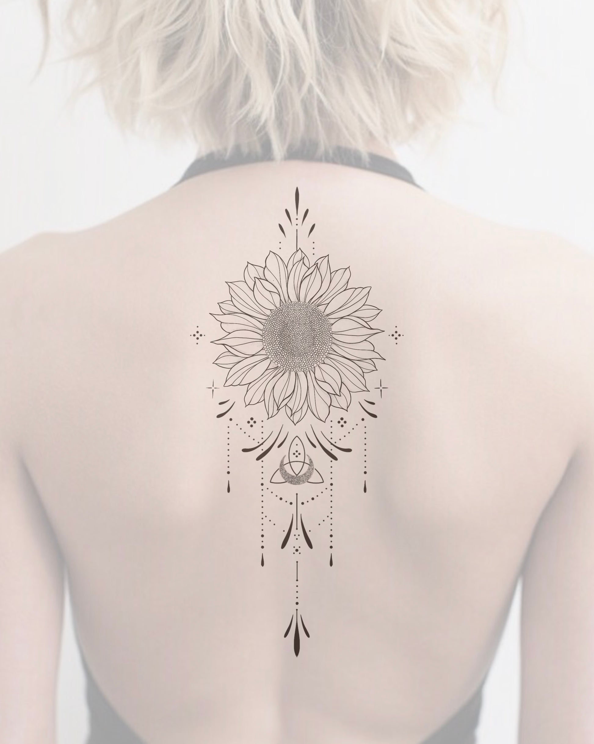 Fine line ornamental back piece tattoo design by Tali at The Ink Factory Dublin